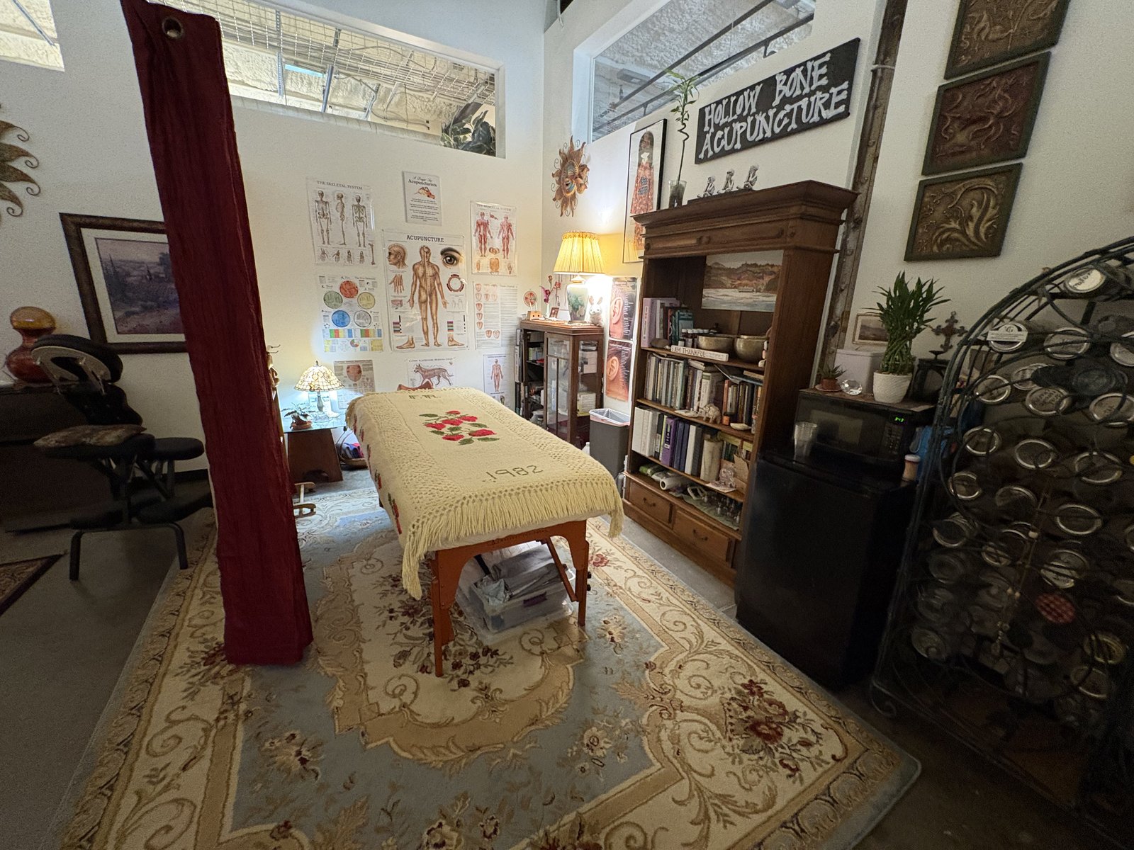 The acupuncture treatment table in Kym’s WOMPA office