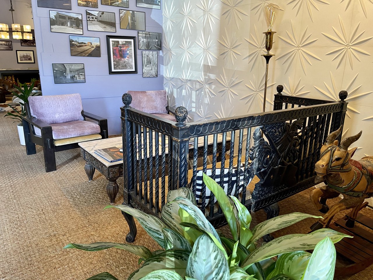 Artwork, furniture, plants and creative design details in a WOMPA communal area