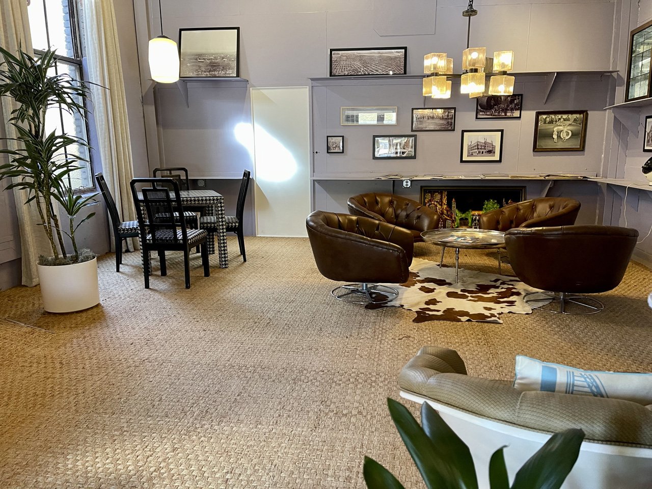 Vintage furniture arranged as a comfortable seating area at WOMPA
