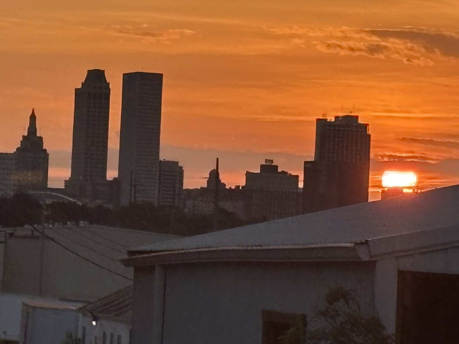 Tulsa skyline at sunset viewed from the WOMPA terrace